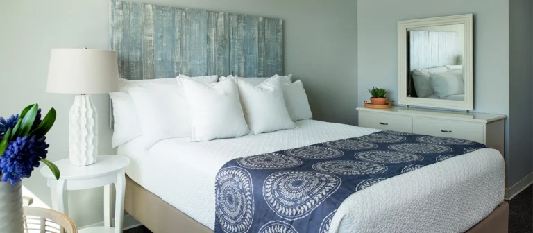 Bright coastal-style king room in the lower building with updated furnishings and oceanfront atmosphere.