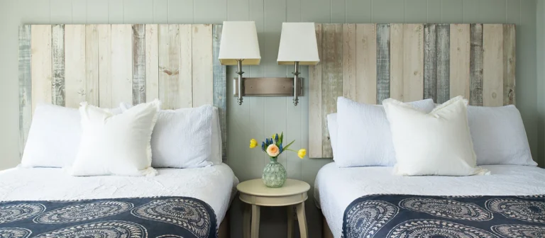 Two-bed oceanfront guest room interior at The Cutty Sark Motel.