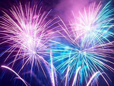 Colorful fireworks lighting up the night sky during summer celebrations in York Beach, Maine.